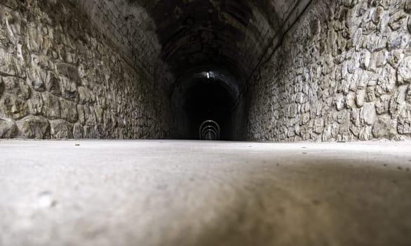 Detail of old and abandoned underground tunnel, scary