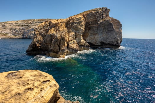 Tilt Rock Il, Viewpoint in Dwejra Bay, rock formation on the Mediterranean sea. Gozo island Malta.