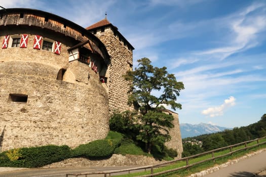 View from the cobble stone road, street onto the Vaduz Castle, Schloss Vaduz, the palace and official residence of the Prince of Liechtenstein in Vaduz, Liechtenstein 2022