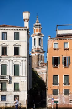 Venice, Italy - September 5, 2022: Houses and palaces seen from a motorboat cruise along the Grand Canal in Venice
