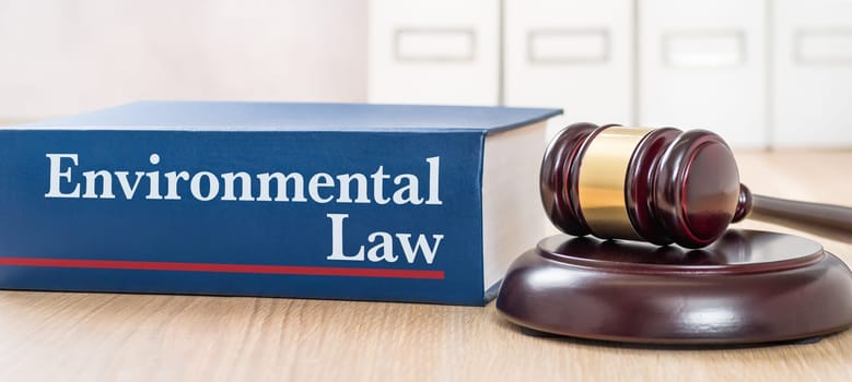 A law book with a gavel - Environmental law