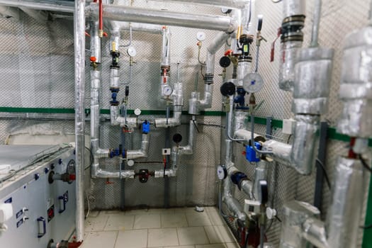 Pressure sensor in an industrial boiler room. Barometer in a heating system. Close-up.