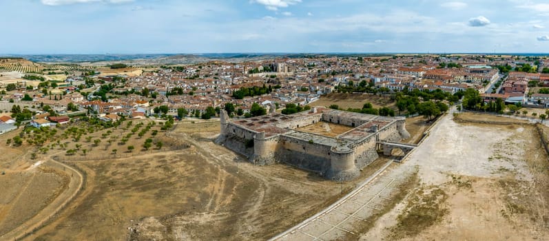 Panoramic aerial view of the Medieval Castle of Chinchon, province of Madrid. cataloged as beautiful towns of Spain