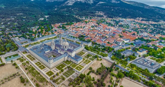 Aerial view of the Royal Monastery of San Lorenzo de El Escorial near Madrid, Spain. Rear side panoramic aerial view