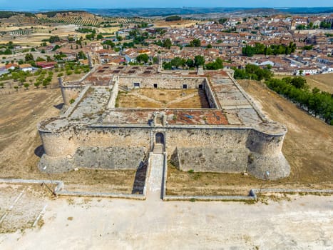 Panoramic aerial view of the Medieval Castle of Chinchon, province of Madrid. cataloged as beautiful towns of Spain
