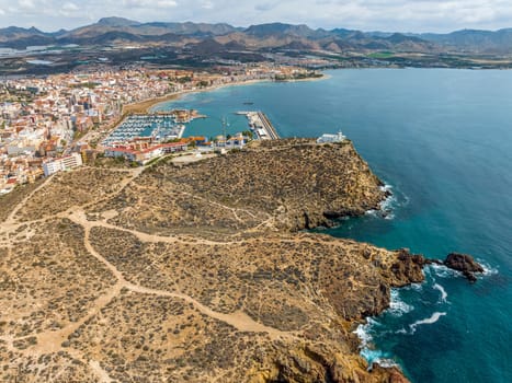 Panoramic aerial view of the fishing port and lighthouse of Mazarron, La Galerica, province of Murcia. Spain