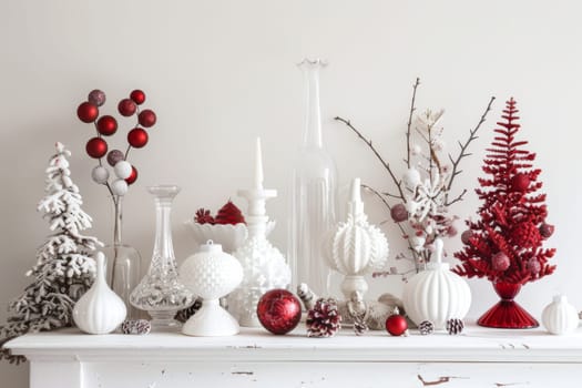 A white mantle with a red tree and white vases with red balls. The vases are of different shapes and sizes