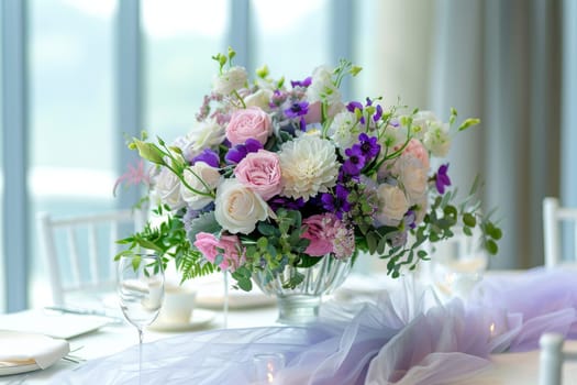 Elegant floral table decor against a soft transparent white backdrop, perfect for special occasions