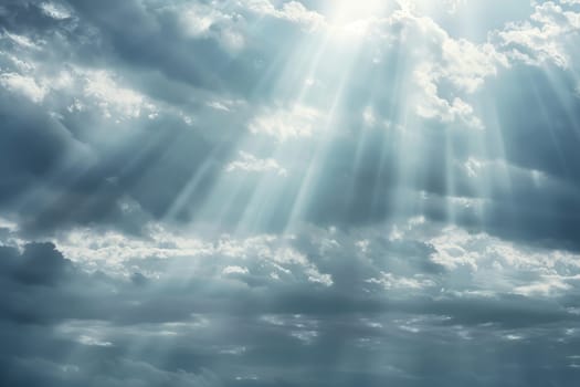 The sky is cloudy and the sun is shining through the clouds. The sun is casting a warm glow on the clouds, creating a peaceful and serene atmosphere