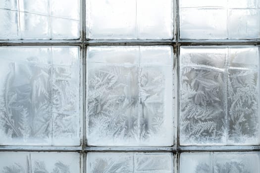 Frosty windowpane texture against a transparent white surface, adding a touch of wintry charm