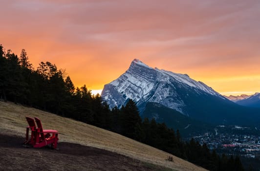 Stunning sunrise scenery of Mount Rundle and Banff town in Banff National Park in Alberta, Canada. Seen from a vantage point on the road to Mount Norquay.