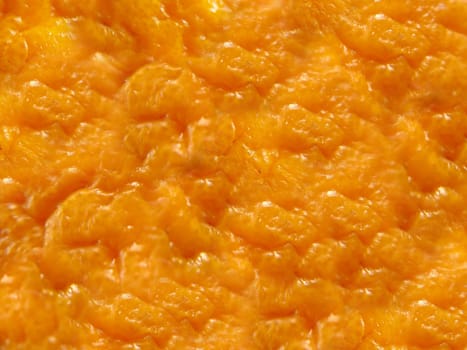 The texture of the background is a close-up of the orange peel on top.Macro photography.Texture or background.Selective focus.