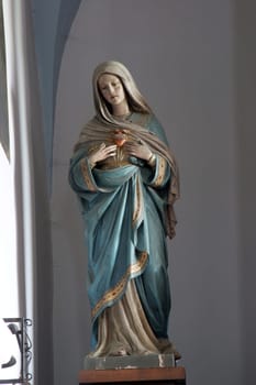 Immaculate heart of Mary, statue on the main altar in the Saint Dominic Parish Church in Konjscina, Croatia