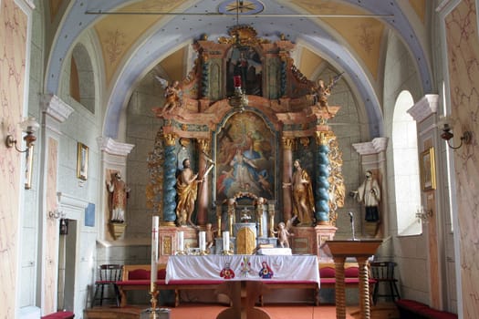 Main altar in the parish church of the Holy Trinity in Klenovnik, Croatia
