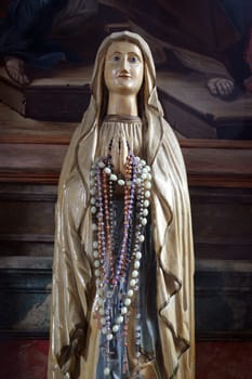 Virgin Mary, statue on the altar in the Holy Trinity Parish Church in Klenovnik, Croatia