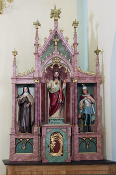 Altar of Sacred Heart of Jesus in the parish church of Saint Luke in Lukac, Croatia