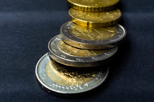 Euro close up photos. Macro coins. Soft focus, dark background