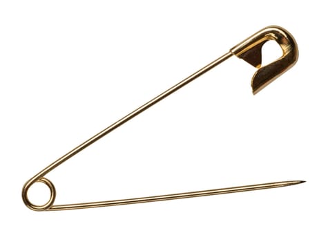 Golden metal safety pin on isolated background, close up