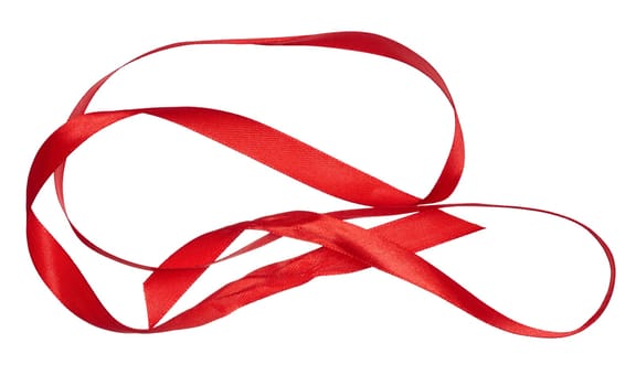 Piece of red satin ribbon on isolated background, close up
