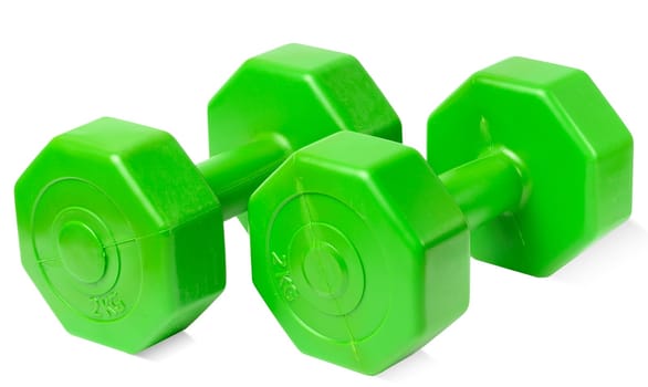 Green plastic dumbbell on a white isolated background, sports equipment. set