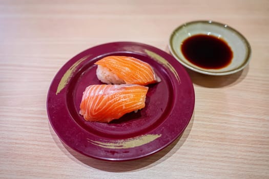 Salmon sushi in the plate. Sushi is a type of food preparation originating in Japan.