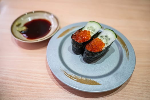 Ikura sushi in the plate. Sushi is a type of food preparation originating in Japan.
