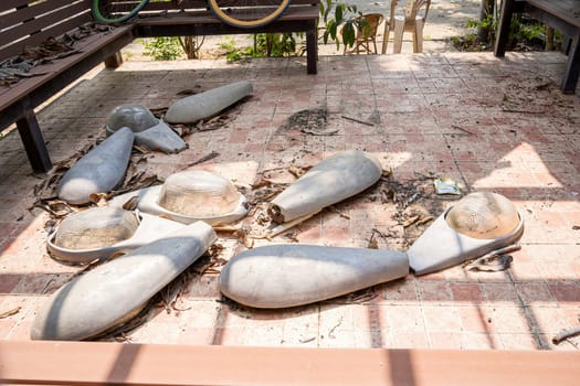 Conditions outside the house were abandoned, broken light bulbs, broken items.