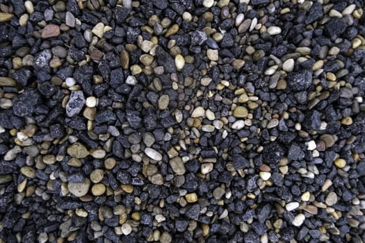 Detail of wet boulders on a cold rainy day