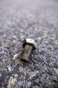 Detail of old broken and rusty industrial nut