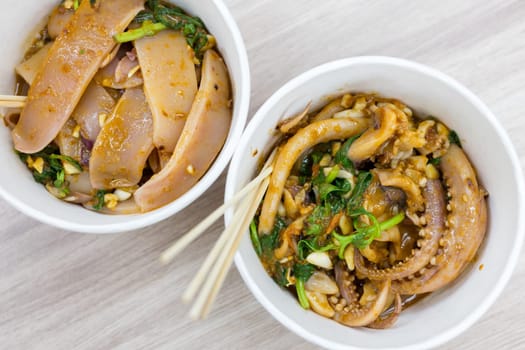 Chili satay sauce squid in the night market