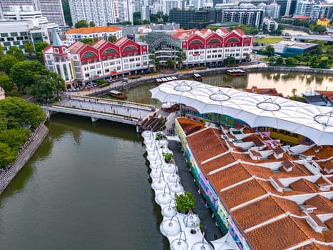 SINGAPORE - MAY 12, 2024: Clarke Quay after sunset, popular nightlife district of Singapore