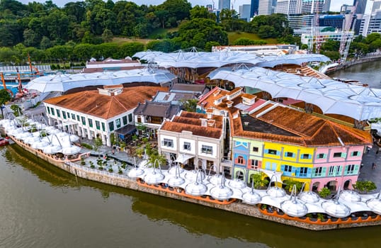 SINGAPORE - MAY 12, 2024: Clarke Quay after sunset, popular nightlife district of Singapore