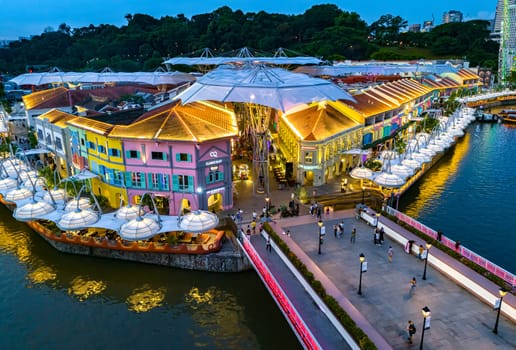 SINGAPORE - MAY 12, 2024: Clarke Quay after sunset, popular nightlife district of Singapore
