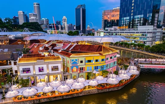 SINGAPORE - MAY 12, 2024: Clarke Quay after sunset, popular nightlife district of Singapore