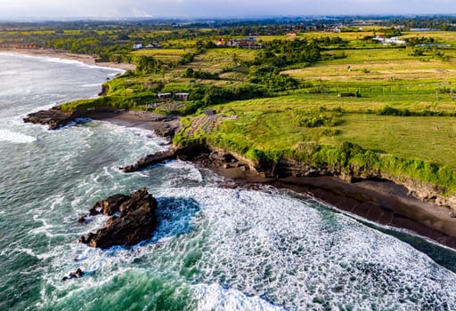 Cliff sea coast near Tanah Lot, Bali, Indonesia