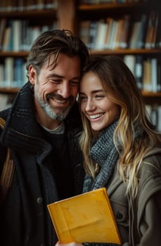 A man and a woman are standing together, both smiling brightly as they hold a book in their hands. They appear happy and content, enjoying a moment of shared literary appreciation.