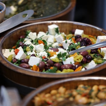 Greek salad with feta cheese and  olives. Typical delicious greek style lunch