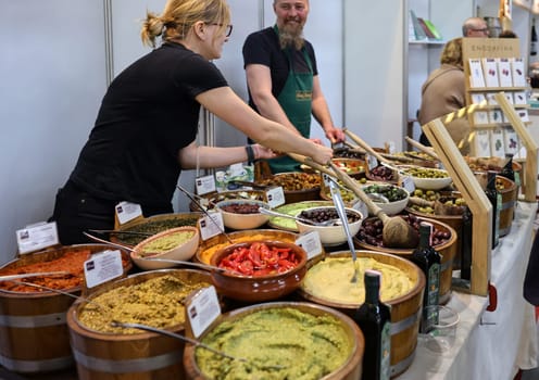 Cracow, Poland - November 3, 2021: Presentation and tasting of typical and world-famous Italian food products at Enoexpo and Gastrofood - Trade Fair for Food and Drinks for Catering