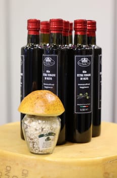 Cracow, Poland - November 3, 2021: Presentation of typical and world-famous Italian food products Extra virgin olive oil and salt at Enoexpo and Gastrofood - Trade Fair for Food and Drinks for Catering