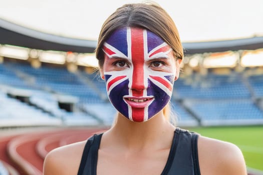 British Female Athlete with British Flag Painted on Her Face at Sports Stadium.