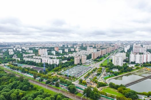 Top view of the city of Moscow, buildings and roads and other infrastructure of the city. Cityscape view from above.