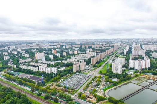 Top view of the city of Moscow, buildings and roads and other infrastructure of the city. Cityscape view from above.