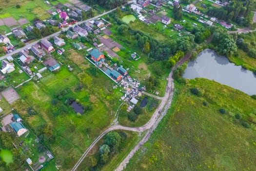Top view of the village, fields and forests near the village