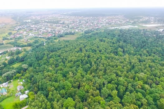 Top view of the village, fields and forests near the village