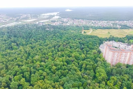 Top view of the village, fields and forests near the village