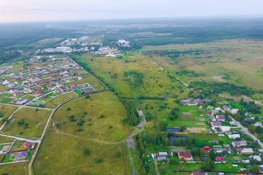 Top view of the village, fields and forests near the village