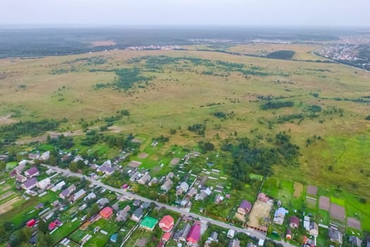 Top view of the village, fields and forests near the village