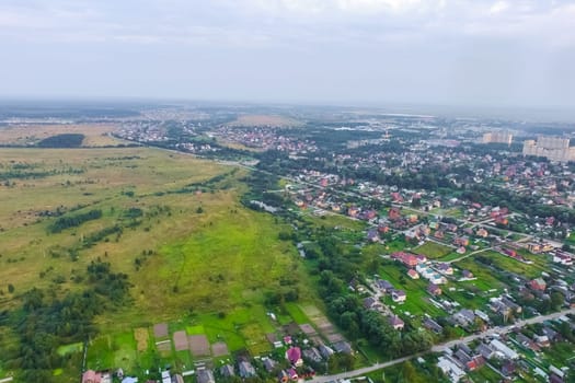 Top view of the village, fields and forests near the village