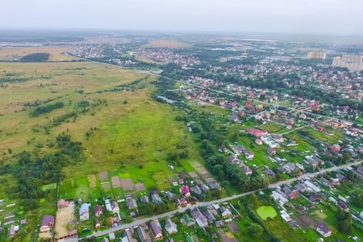 Top view of the village, fields and forests near the village