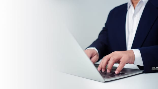 Businessman entrepreneur working in office and working Give advice to customers with the system computer in office and provide information services to customers, Business technologies concept.